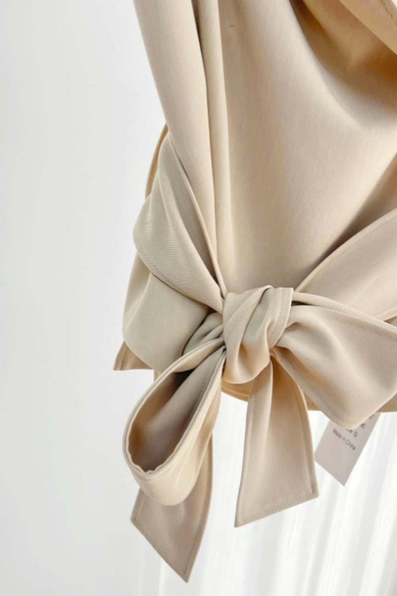 ASYMMETRICAL WRAP TOP